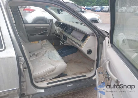 1990 Lincoln Town Car Signature z USA, uszkodzony, nr VIN 1LNLM82F2LY744198